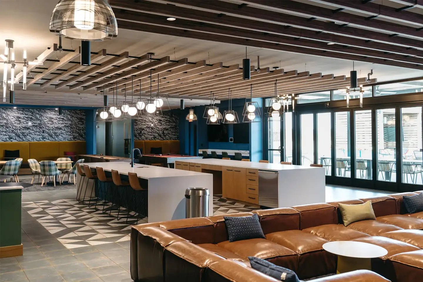 welcoming study center in apartment complex with shared and private seating.