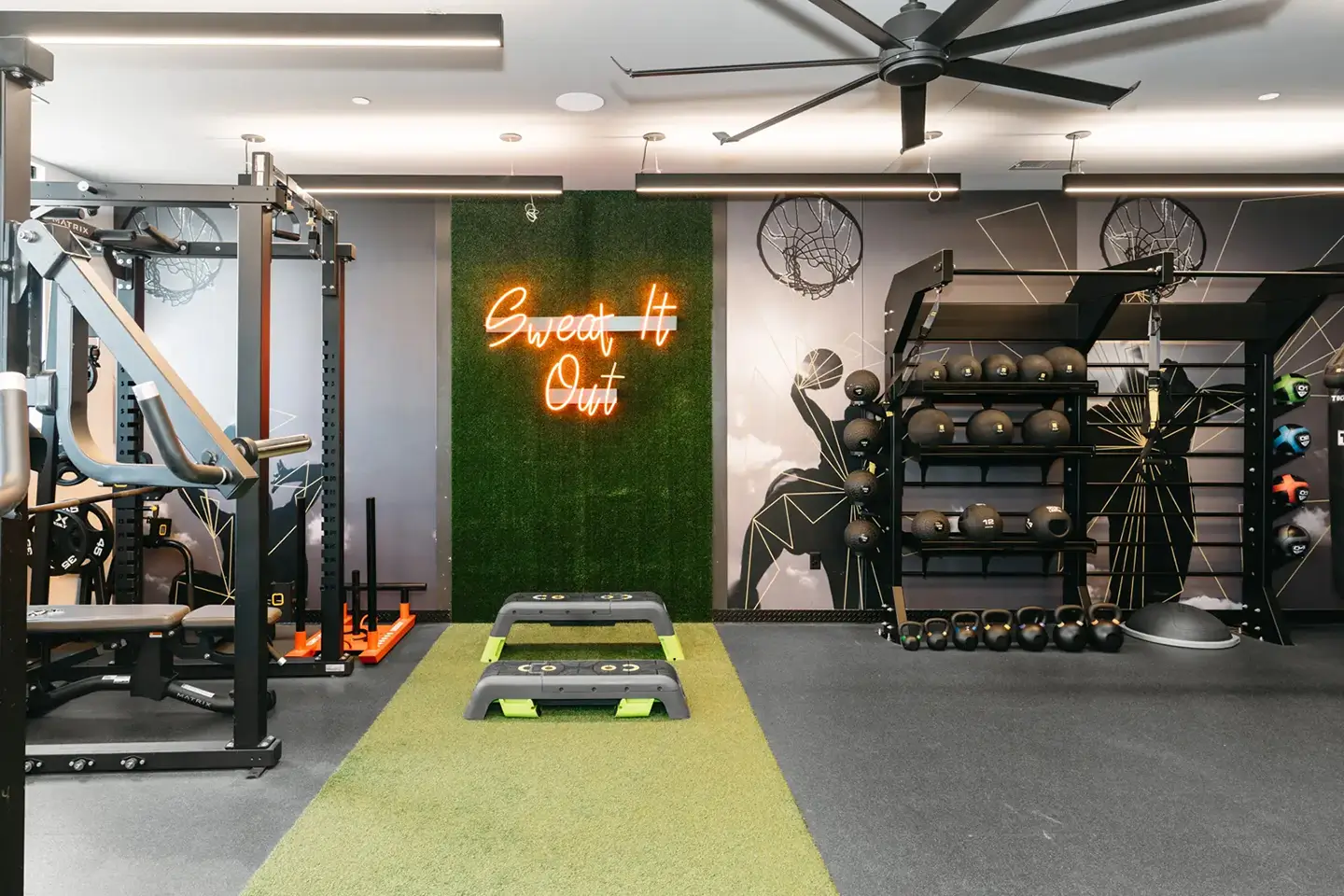 apartment gym with weights and machines