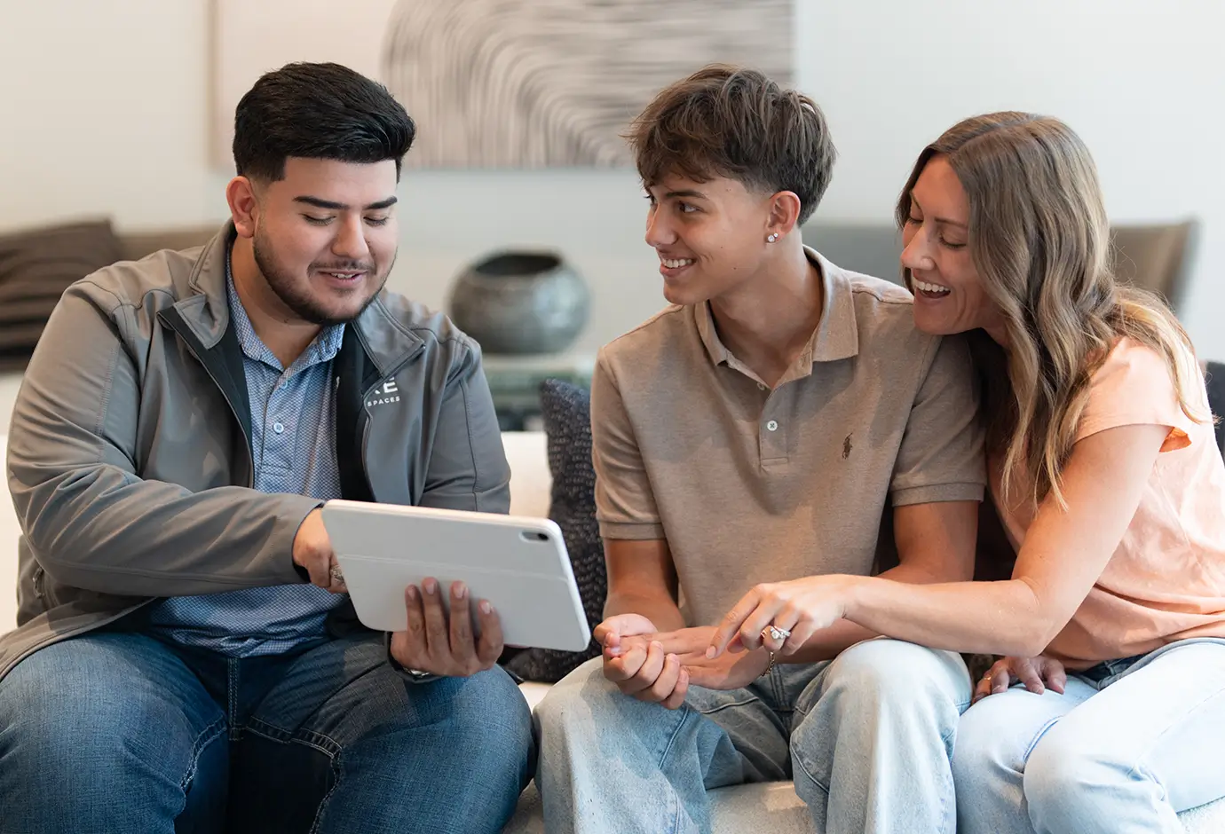 family looking at a tablet